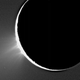 This image of Saturn’s moon Enceladus, taken by the Cassini probe in 2005, shows plumes of material over its south pole.